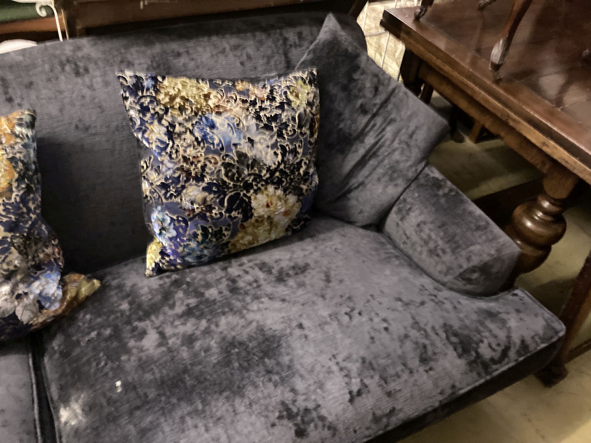 A modern contemporary large sofa upholstered in dark blue velvet, length 230cm, depth 110cm, height 80cm